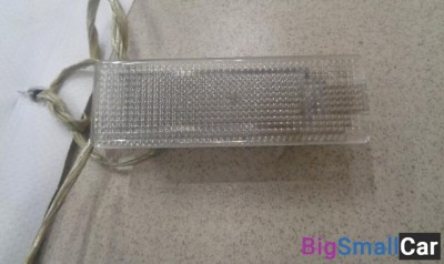 Фонарь подсветки номера от Volkswagen Golf 6 2008-2013 - купить Москве