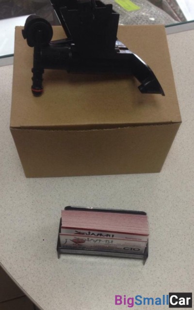 Форсунка омывателя фар правая Toyota Corolla 150